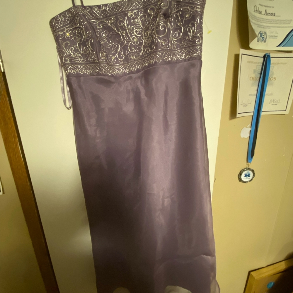 Michelangelo dress, size 8 lavender in color worn once.